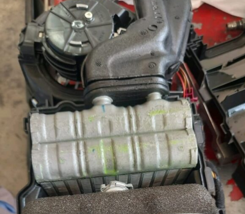 Low-pressure AC hose replacement on a Mercedes-Benz due to hissing noise