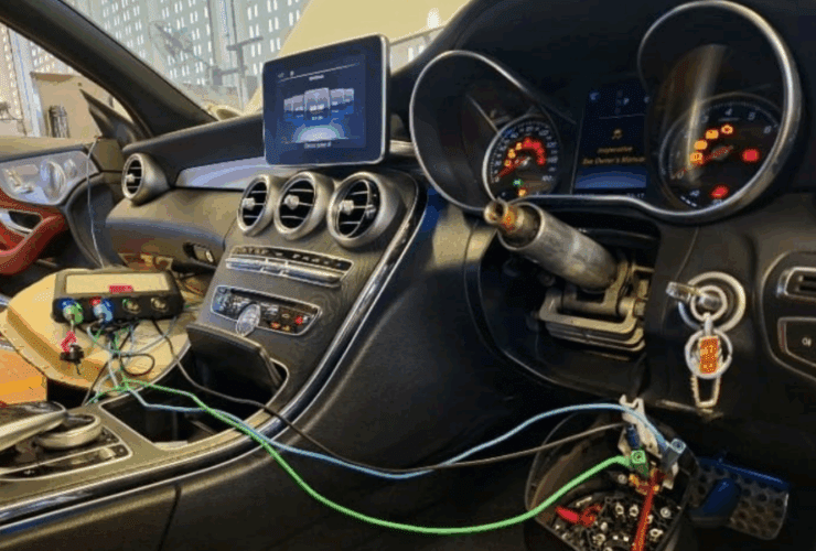 Mercedes-Benz interior showing diagnostic tools connected to the ignition and dashboard warning lights during no-start troubleshooting.